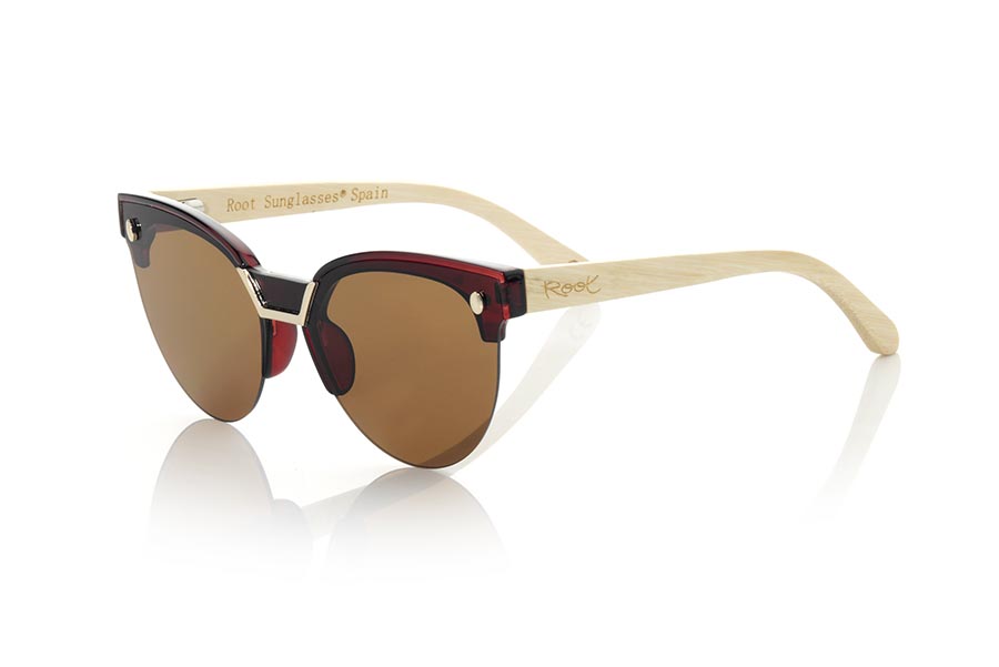 Gafas de Madera Natural de Bambú ZAHORA MX. Las gafas de sol ZAHORA MX están fabricadas con el frontal en material PC de color rojo y las varillas de madera de BAMBÚ Natural. Modelo muy femenino de formas sugerentes con montura tipo ceja inspiradas en las playas de ZAHORA, las gafas ZAHORA MX han sido combinadas de serie con varias lentes. Medida frontal: 147x55mm Venta al Por Mayor y Detalle | Root Sunglasses® 