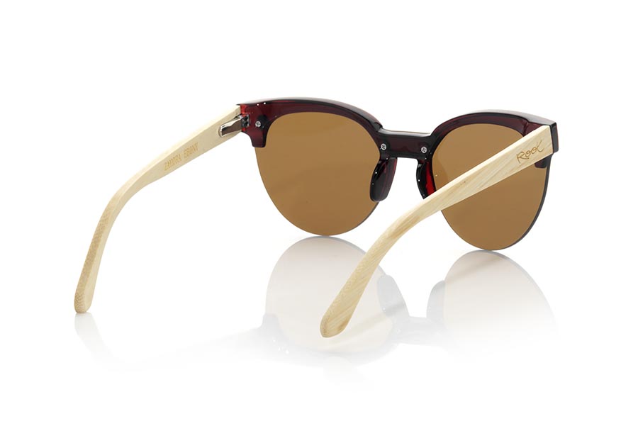 Wood eyewear of Bamboo ZAHORA MX. Sunglasses ZAHORA MX are made with the front in red PC material and Natural bamboo wood sideburns. Very feminine model of suggestive shapes with eyebrow mount inspired by the beaches of ZAHORA, the ZAHORA MX goggles have been combined with several lenses. Frontal measurement: 147x55mm for Wholesale & Retail | Root Sunglasses® 