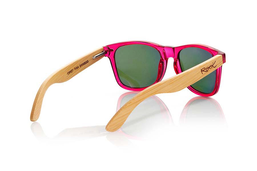 Wood eyewear of Bamboo CANDY PINK. Candy Green sunglasses are made with synthetic dark red transparent front and sideburns in natural bamboo combined with four lens colors that will adapt perfectly to your taste and your modern style. Front Measure: 148x50mm for Wholesale & Retail | Root Sunglasses® 