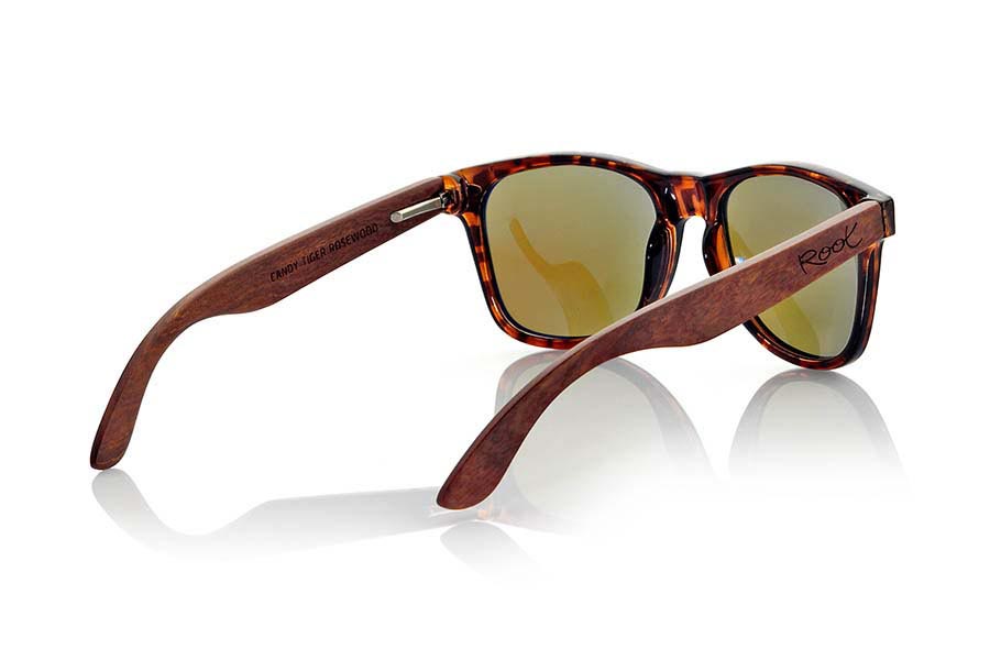 Wood eyewear of Rosewood CANDY TIGER. Candy Tiger sunglasses are made with Carey style synthetic transparent front and sideburns in natural rosewood combined with four lens colors that will adapt perfectly to your taste and your modern style. Front Measure: 148x50mm for Wholesale & Retail | Root Sunglasses® 