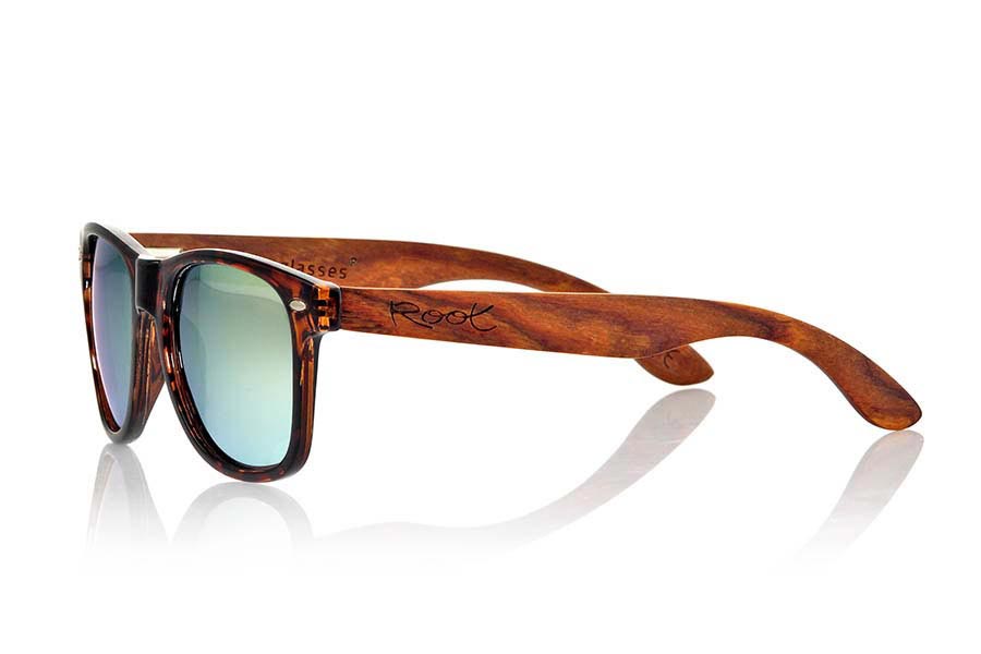 Wood eyewear of Rosewood CANDY TIGER. Candy Tiger sunglasses are made with Carey style synthetic transparent front and sideburns in natural rosewood combined with four lens colors that will adapt perfectly to your taste and your modern style. Front Measure: 148x50mm for Wholesale & Retail | Root Sunglasses® 