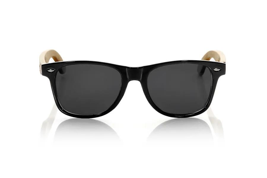 Gafas de Madera Natural de Bambú CANDY BLACK. Las gafas de sol Candy Black están realizadas con el frontal de material sintético transparente en negro brillo y las varillas en madera de bambú natural combinadas con cuatro colores de lentes que se adaptarán a la perfección a tu gusto y a tu estilo moderno. Medida frontal: 148x50mm Venta al Por Mayor y Detalle | Root Sunglasses® 