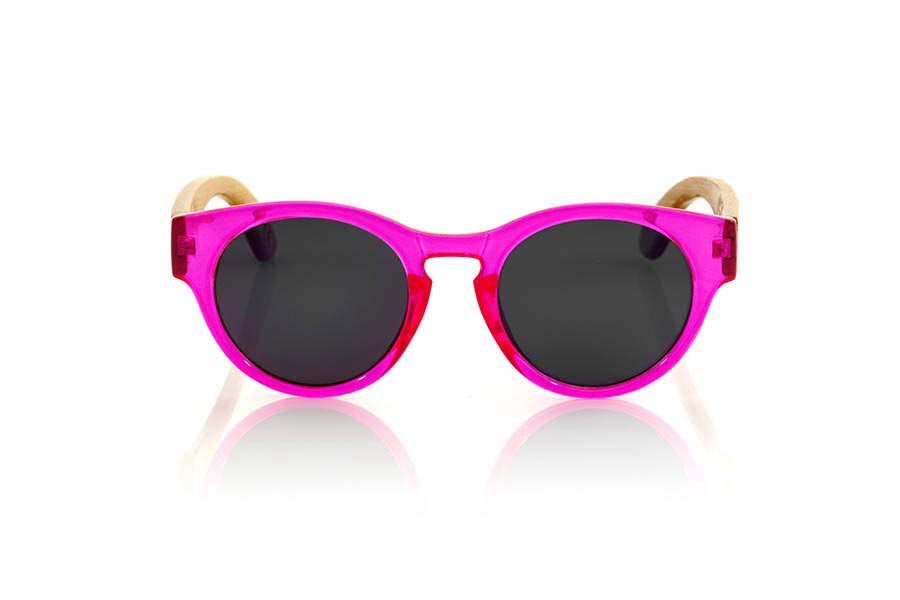 Wood eyewear of Bamboo GUM PINK. Gum Pink sunglasses are made with transparent sinthetic pink color front and sideburns in natural bamboo combined with four lens colors that will adapt perfectly to your taste and your modern style. It is a rounded frame unisex standard size easy to carry. Front Measure: 148x50mm for Wholesale & Retail | Root Sunglasses® 