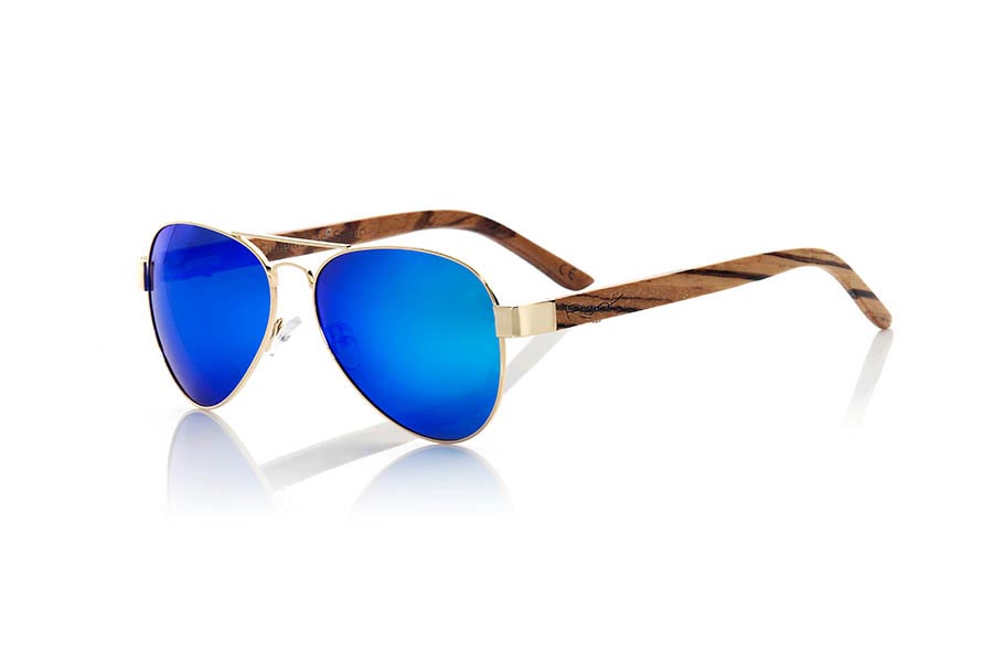 Wood eyewear of Zebrano BERLIN. BERLIN sunglasses are made from the metal frame and sideburns natural Zebrano wood. A classic Aviator style model series combined with yellow lenses REVO, REVO Blue or Gray REVO. You'll love the combination of zebra wood. Front Measure: 150x50mm for Wholesale & Retail | Root Sunglasses® 