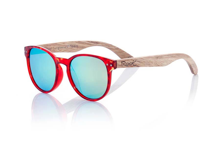 Gafas de Madera Natural de Dumu VIENNA. Las gafas de sol VIENNA están fabricadas con el frontal en material sintético de color carey rojo y las varillas de madera de Duwood Natural. Se trata de un modelo de formas redondeadas y montura muy fina que sienta bien a todo tipo de personas, las gafas VIENNA han sido combinadas de serie con lentes Grises y Morado REVO. Medida frontal: 143x47mm Venta al Por Mayor y Detalle | Root Sunglasses® 