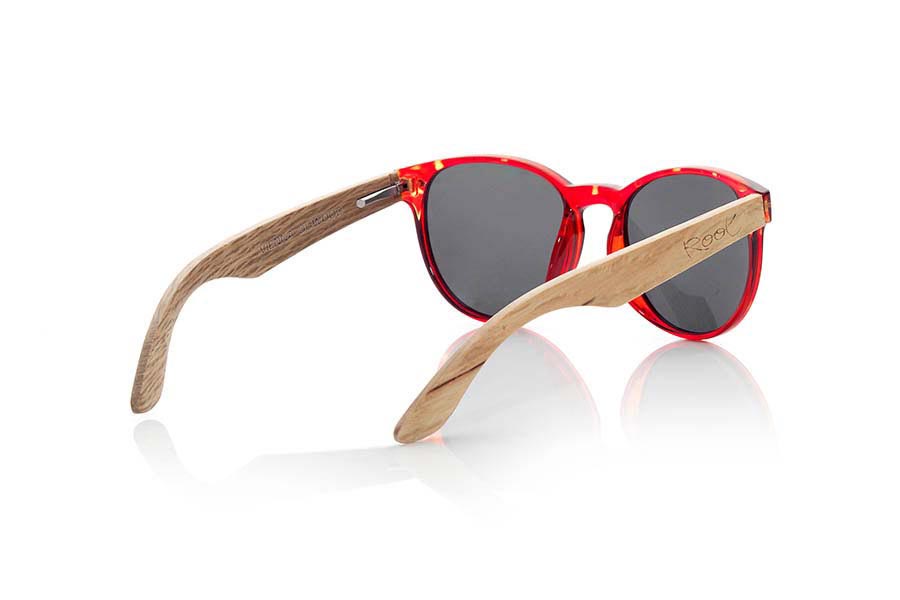 Wood eyewear of Duwood VIENNA. VIENNA sunglasses are made of synthetic material front carey red color and wooden pins Natural Duwood. It is a model of fine rounded shapes and mount that feel good to all kinds of people, VIENNA glasses have been combined as standard with Grey and Purple REVO lenses. Front Measure: 143x47mm for Wholesale & Retail | Root Sunglasses® 