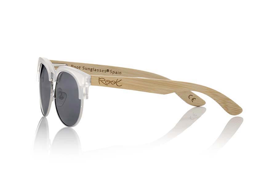 Wood eyewear of Bamboo DUNE TR. DUNE BLACK sunglasses are made with the front of a Matt transparent synthetic material and sideburns in natural bamboo wood, open front, metallic bridge with adjustable nose pads combined with four colors of lenses that will adapt perfectly to your taste and to your modern style. Measure front: 139X49mm for Wholesale & Retail | Root Sunglasses® 