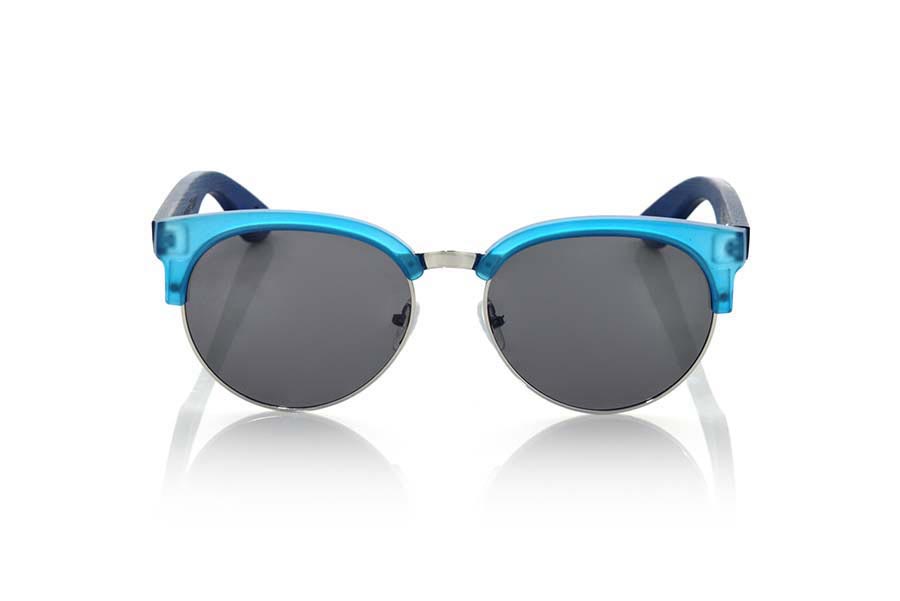 Wood eyewear of  DUNE BLUE. DUNE BLUE sunglasses are made with the front of transparent matte blue synthetic material and sideburns in natural bamboo blue stained, with open front, metal bridge and adjustable nose pads combined with four colors of lenses that will adapt perfectly to your taste and to your modern style. Front size: 139X49mm for Wholesale & Retail | Root Sunglasses® 