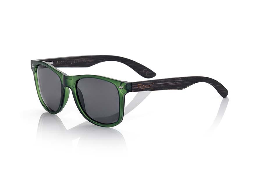 Wood eyewear of  SUN GREEN MX. SUN GREEN MX sunglasses are manufactured with the front panel green Matt transparent synthetic material and natural bamboo wood pins combined with four colors of lenses that allow you to adapt to your style. Front size: 145x48mm for Wholesale & Retail | Root Sunglasses® 