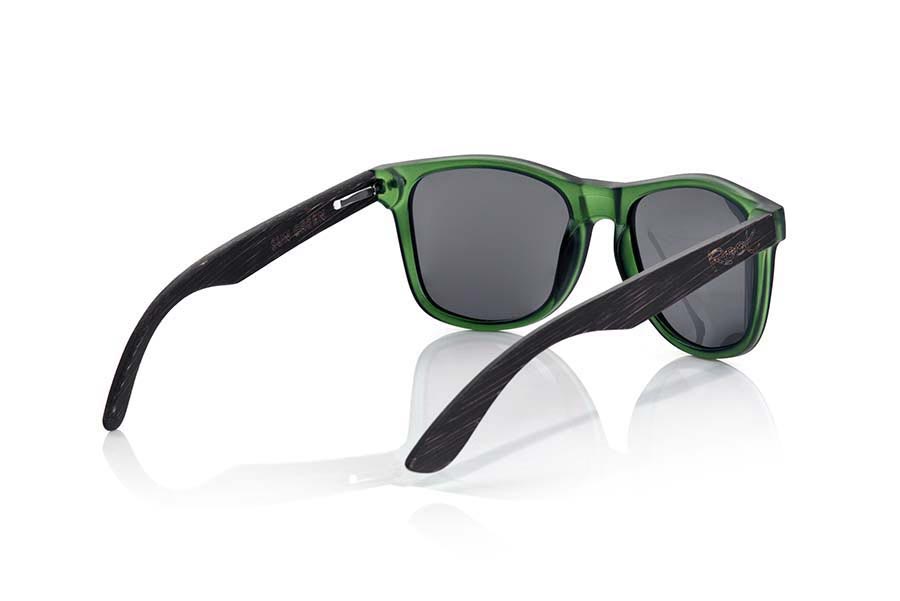 Wood eyewear of  SUN GREEN MX. SUN GREEN MX sunglasses are manufactured with the front panel green Matt transparent synthetic material and natural bamboo wood pins combined with four colors of lenses that allow you to adapt to your style. Front size: 145x48mm for Wholesale & Retail | Root Sunglasses® 