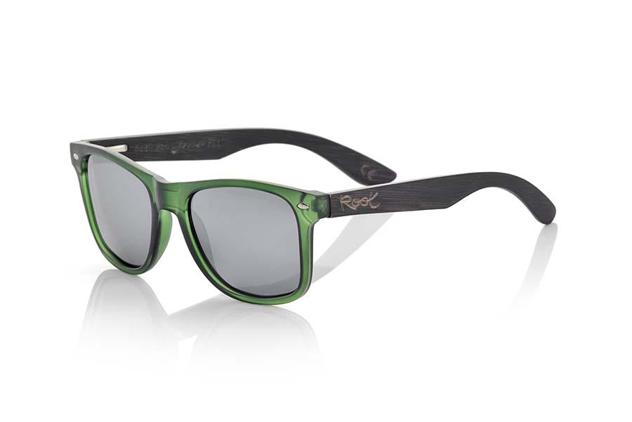 Wood eyewear of  SUN GREEN MX. SUN GREEN MX sunglasses are manufactured with the front panel green Matt transparent synthetic material and natural bamboo wood pins combined with four colors of lenses that allow you to adapt to your style. Front size: 145x48mm for Wholesale & Retail | Root Sunglasses® 