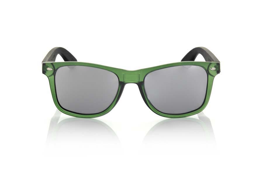 Wood eyewear of  SUN GREEN MX. SUN GREEN MX sunglasses are manufactured with the front panel green Matt transparent synthetic material and natural bamboo wood pins combined with four colors of lenses that allow you to adapt to your style. Front size: 145x48mm for Wholesale & Retail | Root Sunglasses® 