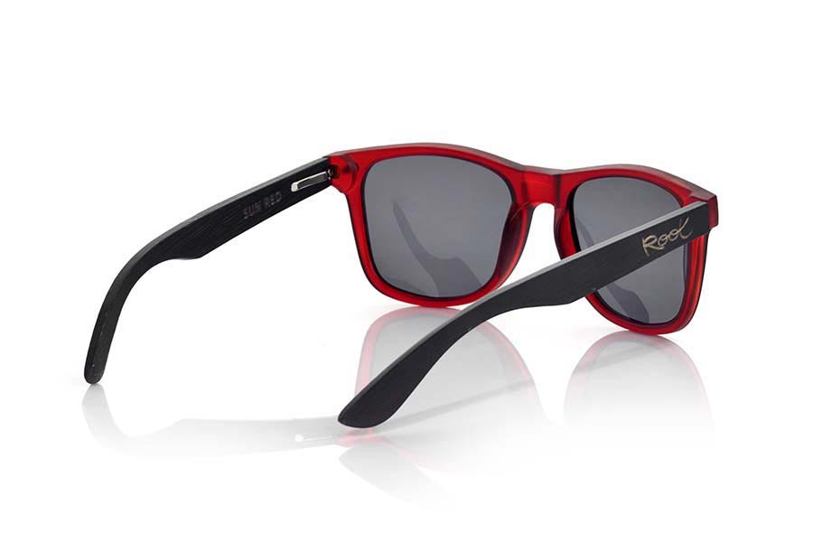 Wood eyewear of Bamboo SUN RED MX. SUN network MX sunglasses are manufactured with the front panel red matte transparent synthetic material and natural bamboo wood pins combined with four colors of lenses that allow you to adapt to your style. Front size: 145x48mm for Wholesale & Retail | Root Sunglasses® 