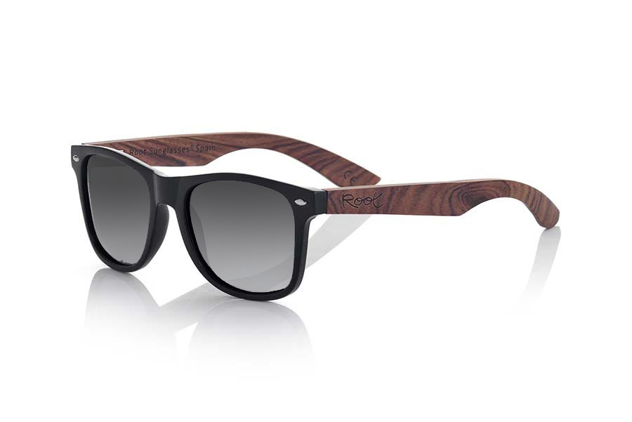 Wood eyewear of Rosewood SUN MATT MX. SUN MATT MX sunglasses are manufactured with the front panel Matt Black synthetic material and natural rosewood pins combined with four colors of lenses that allow you to adapt to your style. Front size: 145x48mm for Wholesale & Retail | Root Sunglasses® 