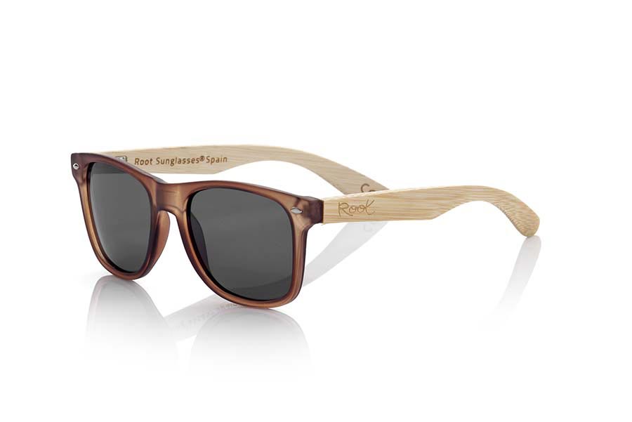 Wood eyewear of Bamboo SUN BROWN MX. SUN BROWN MX sunglasses are manufactured with the front matte transparent Brown plastic and natural bamboo wood pins combined with four colors of lenses that allow you to adapt to your style. Front size: 145x48mm for Wholesale & Retail | Root Sunglasses® 