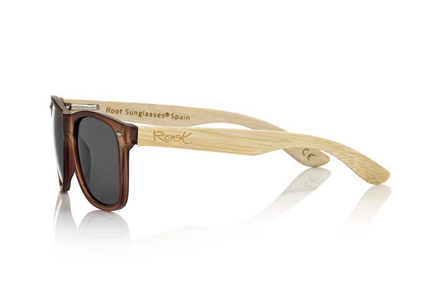 Wood eyewear of Bamboo SUN BROWN MX. SUN BROWN MX sunglasses are manufactured with the front matte transparent Brown plastic and natural bamboo wood pins combined with four colors of lenses that allow you to adapt to your style. Front size: 145x48mm for Wholesale & Retail | Root Sunglasses® 