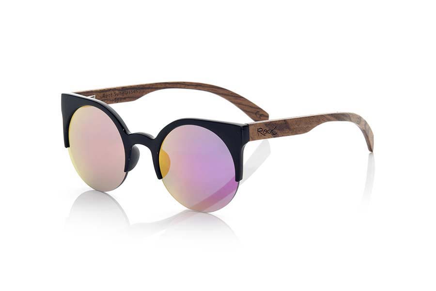 Wood eyewear of Zebrano CAT BLACK. CAT BLACK sunglasses are made of black synthetic material front and sideburns in natural zebrano wood, it's an open round model with straight eyebrow more aimed at a female audience combined with four colors of lenses. Front size: 135X53mm for Wholesale & Retail | Root Sunglasses® 