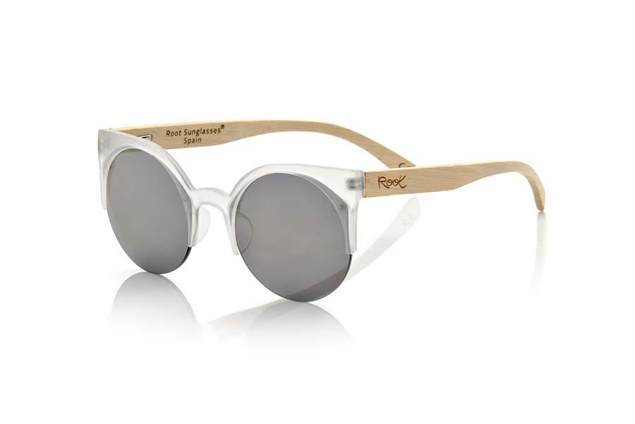 Wood eyewear of Bamboo CAT TR. CAT TORTOISESHELL sunglasses are made with the plastic transparent color front and sideburns in natural bamboo wood, it's an open round model with straight eyebrow more aimed at a female audience combined with four colors of lenses. Front size: 135X53mm for Wholesale & Retail | Root Sunglasses® 