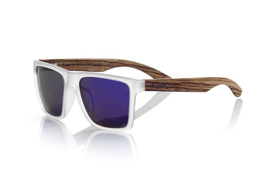 Wood eyewear of Zebrano RUN TR. RUN TR sunglasses are made of transparent matte plastic front and ZEBRA wood pins, it's a very male angled square model with a look at the famous okley combined with four colors of lenses that will adapt perfectly to your taste and to your modern style. Front size: 144X51mm for Wholesale & Retail | Root Sunglasses® 