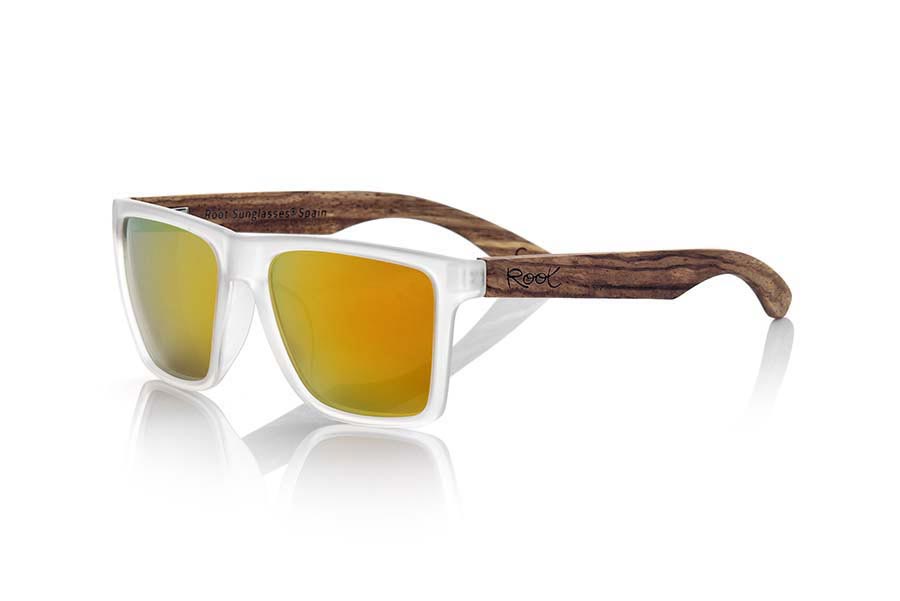 Wood eyewear of Zebrano RUN TR. RUN TR sunglasses are made of transparent matte plastic front and ZEBRA wood pins, it's a very male angled square model with a look at the famous okley combined with four colors of lenses that will adapt perfectly to your taste and to your modern style. Front size: 144X51mm for Wholesale & Retail | Root Sunglasses® 