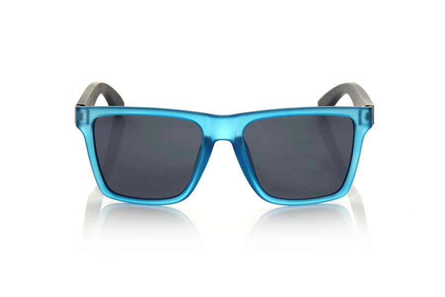 Gafas de Madera Natural de  RUN BLUE. Las gafas de sol RUN BLUE están realizadas con el frontal de material sintético mate transparente y las varillas en madera de BAMBÚ, se trata de un modelo cuadrado anguloso muy masculino con un aire a las famosas okley combinadas con cuatro colores de lentes que se adaptarán a la perfección a tu gusto y a tu estilo moderno. Medida frontal: 144X51mm Venta al Por Mayor y Detalle | Root Sunglasses® 