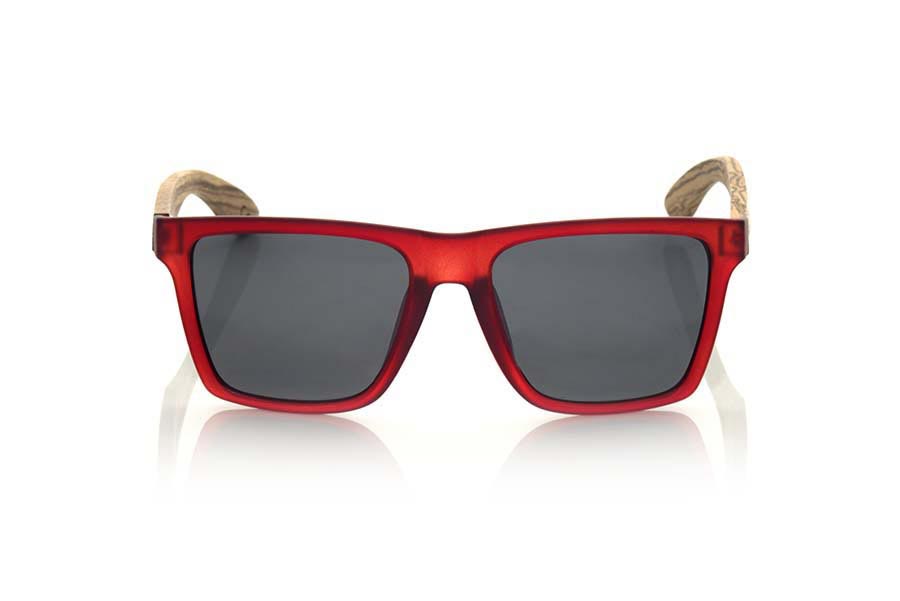 Wood eyewear of Zebrano RUN RED. RUN RED sunglasses are made of transparent matte red synthetic material front and ZEBRA wood pins, it's a very male angled square model with a look at the famous okley combined with four colors of lenses that will adapt perfectly to your taste and to your modern style. Front size: 144X51mm for Wholesale & Retail | Root Sunglasses® 