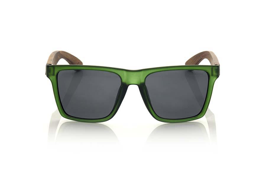 Wood eyewear of Rosewood RUN GREEN. RUN GREEN sunglasses are made with the front of transparent matte green synthetic material and sideburns in ROSEWOOD, it is a very male angled square model with a look at the famous okley combined with four colors of lenses that will adapt perfectly to your taste and to your modern style. Front size: 144X51mm for Wholesale & Retail | Root Sunglasses® 