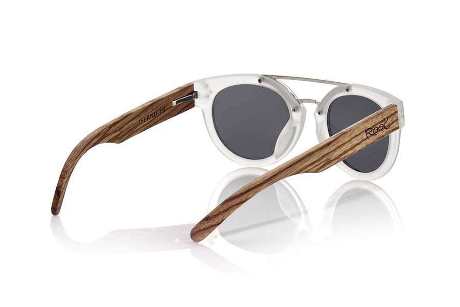 Wood eyewear of Zebrano ISLAND TR. TR ISLAND sunglasses are made with the plastic front style carey and sideburns in natural rosewood, of front thickness, attached by a metallic bridge metallic trim in eyebrow combined with four colors of lenses that will adapt perfectly to your taste and to your modern style. Front size: 137X50mm for Wholesale & Retail | Root Sunglasses® 