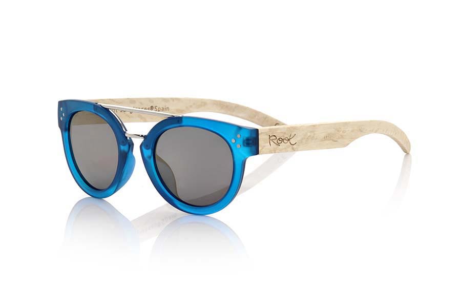 Wood eyewear of  ISLAND BLUE. ISLAND BLUE sunglasses are made with the front of transparent matte blue synthetic material and sideburns in wood of natural duwood of front thickness, attached by a metallic bridge metallic trim in eyebrow combined with four colors of lenses that will adapt perfectly to your taste and to your modern style. Front size: 137X50mm for Wholesale & Retail | Root Sunglasses® 