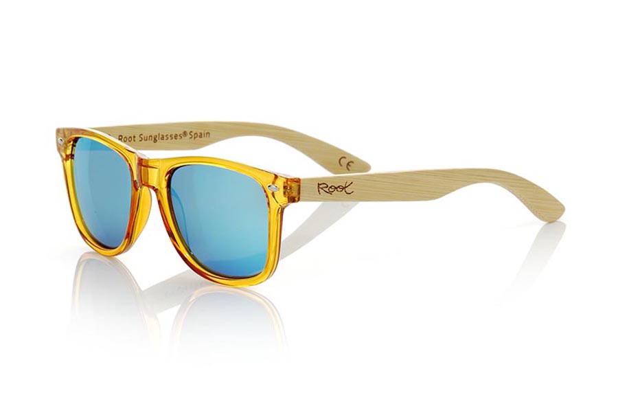 Wood eyewear of Bamboo CANDY YELLOW. Candy Yellow sunglasses are made with synthetic dark Yellow transparent front and sideburns in natural bamboo combined with four lens colors that will adapt perfectly to your taste and your modern style. Front Measure: 148x50mm for Wholesale & Retail | Root Sunglasses® 