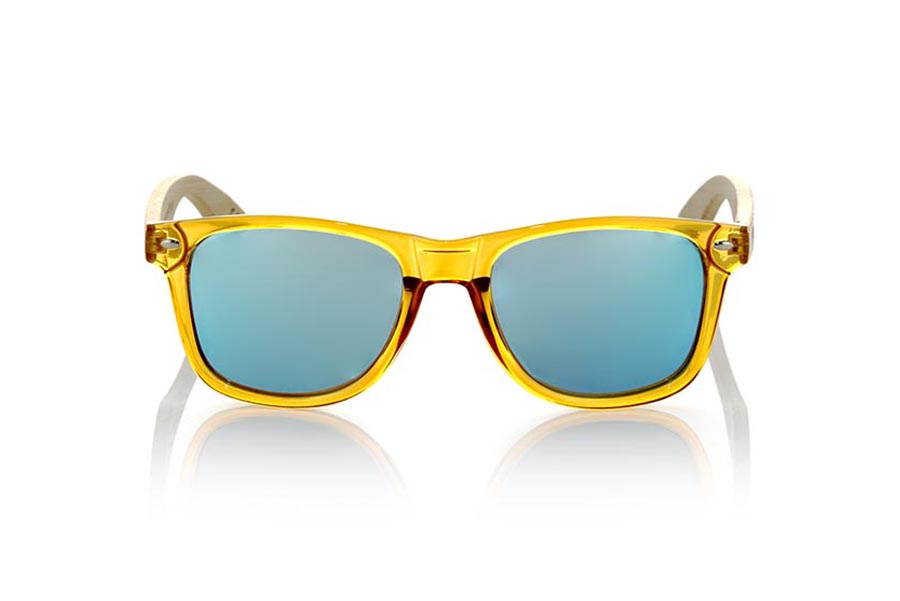 Wood eyewear of Bamboo CANDY YELLOW. Candy Yellow sunglasses are made with synthetic dark Yellow transparent front and sideburns in natural bamboo combined with four lens colors that will adapt perfectly to your taste and your modern style. Front Measure: 148x50mm for Wholesale & Retail | Root Sunglasses® 