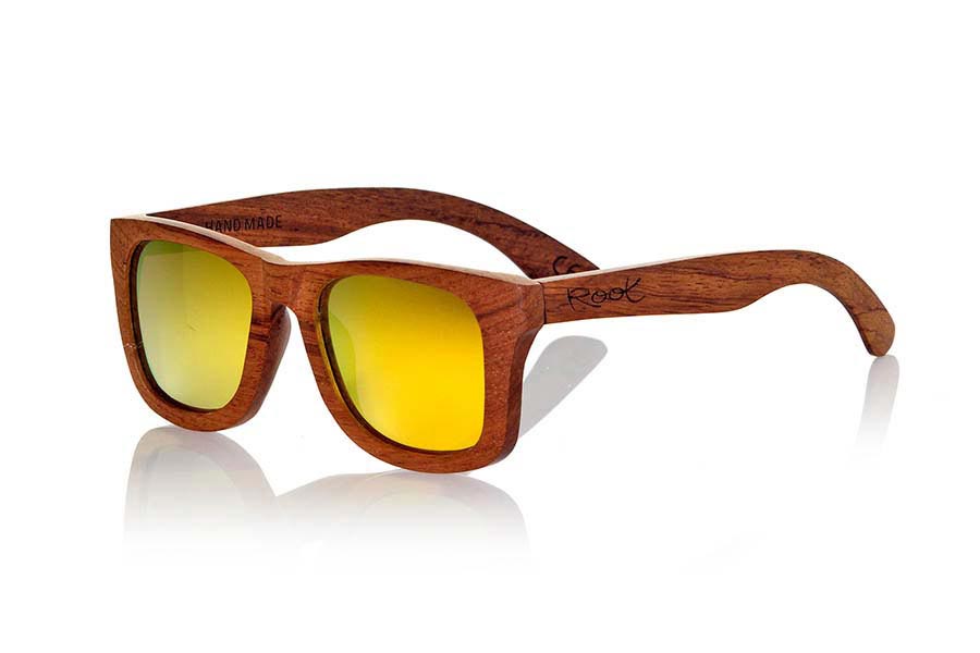 Wood eyewear of Bubinga UYUNI. Uyuni sunglasses are made of natural wood Bubinga also called African rosewood. Wood is a striking and exotic red and have been combined with yellow REVO lenses in a classic frame that sits well to all kinds of people. You'll be amazed at the striking color and grain of the wood. Dimensions: 145x50mm for Wholesale & Retail | Root Sunglasses® 