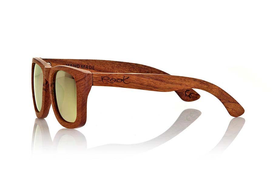 Wood eyewear of Bubinga UYUNI. Uyuni sunglasses are made of natural wood Bubinga also called African rosewood. Wood is a striking and exotic red and have been combined with yellow REVO lenses in a classic frame that sits well to all kinds of people. You'll be amazed at the striking color and grain of the wood. Dimensions: 145x50mm for Wholesale & Retail | Root Sunglasses® 