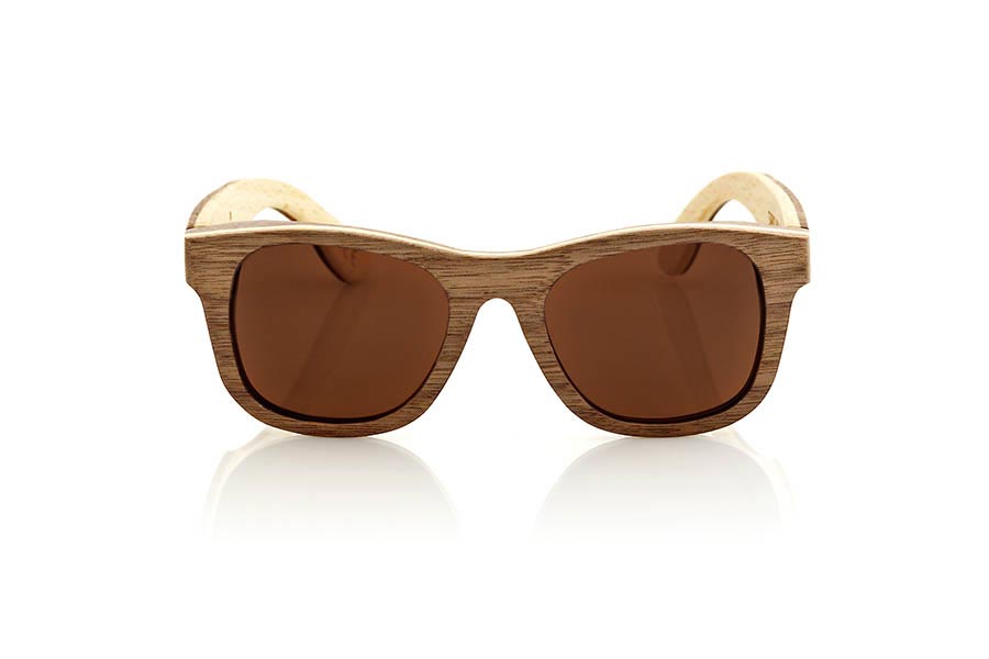 Wood eyewear of Black Walnut SIRIO. Sirio sunglasses are made of walnut and maple woods combined. The front is shown in natural walnut wood and wears a thin layer sandwiched maple wood, while the pins carried inside with a layer of maple wood and a thinner outer Nogal layer . The lenses offer brown or gray. Suitable for all kinds of people. You'll be amazed combining wood. Dimensions: 140x47mm for Wholesale & Retail | Root Sunglasses® 