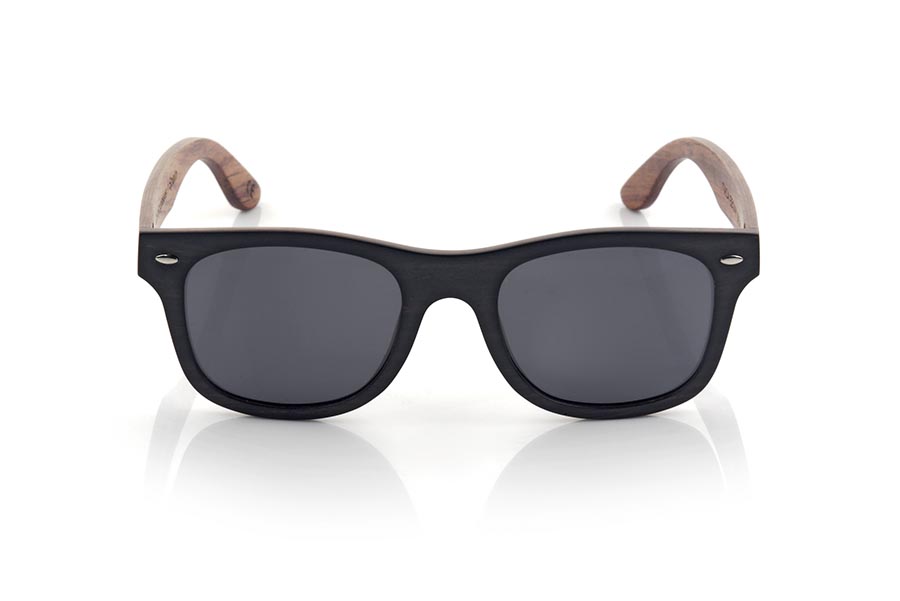 Wood eyewear of Ebony ITACA. New Sunglasses Itaca are made of layered ebony and rosewood (Rosewood) combined, the Front of Ithaca is ebony with a sheet of wood sandwiched Rosewood sandwiched while the pins are entirely made of rosewood in a model of classic lines and a size optimized in serial assemble 3 types of lenses Grey, Brown or Orange REVO. You'll be amazed its careful combination of woods termination form and variety of lenses available. Front Measure: 148x47mm for Wholesale & Retail | Root Sunglasses® 