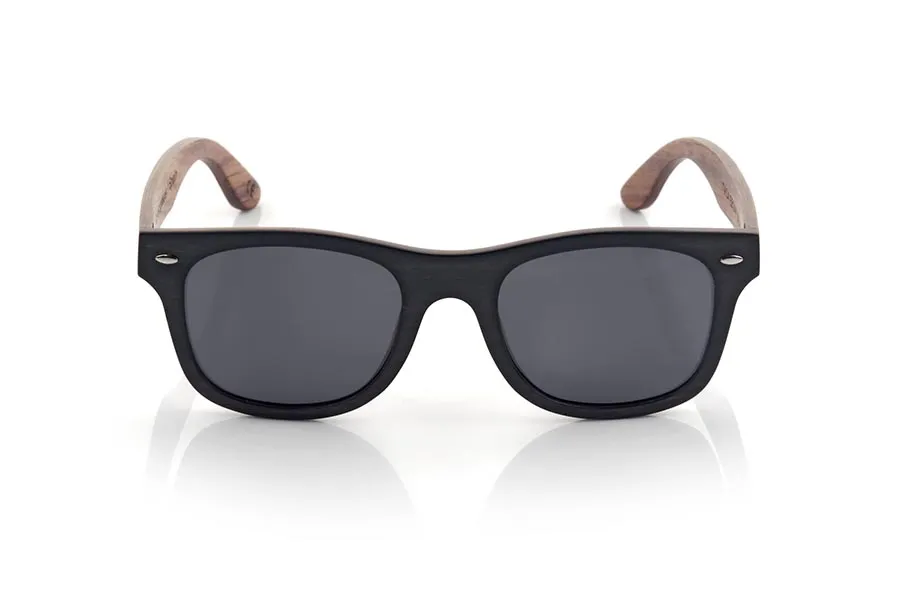 Wood eyewear of Ebony ITACA. New Sunglasses Itaca are made of layered ebony and rosewood (Rosewood) combined, the Front of Ithaca is ebony with a sheet of wood sandwiched Rosewood sandwiched while the pins are entirely made of rosewood in a model of classic lines and a size optimized in serial assemble 3 types of lenses Grey, Brown or Orange REVO. You'll be amazed its careful combination of woods termination form and variety of lenses available. Front Measure: 148x47mm for Wholesale & Retail | Root Sunglasses® 