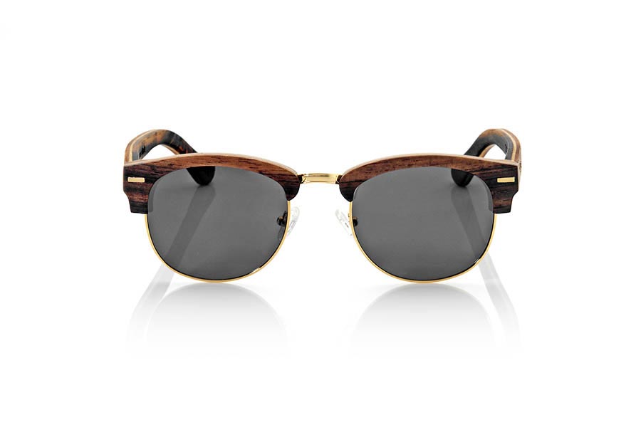 Wood eyewear of Ebony ICARO. ICARO sunglasses are made of a combination of three wood, ebony, maple and rosewood combined in different layers. the front comes in ebony wood an intermediate layer of maple wood and the inside of Rosewood while on pins this pattern being rosewood on the outside and ebony wood inside is reversed. It is a unisex open lower ring with a gold standard Tanao that adapts to all kinds of faces and people model. The've combined with various types of PC lenses. Front Measure: 143x46mm for Wholesale & Retail | Root Sunglasses® 