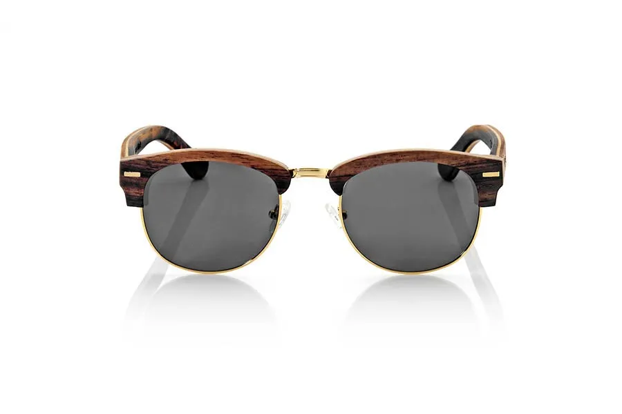 Wood eyewear of Ebony ICARO. ICARO sunglasses are made of a combination of three wood, ebony, maple and rosewood combined in different layers. the front comes in ebony wood an intermediate layer of maple wood and the inside of Rosewood while on pins this pattern being rosewood on the outside and ebony wood inside is reversed. It is a unisex open lower ring with a gold standard Tanao that adapts to all kinds of faces and people model. The've combined with various types of PC lenses. Front Measure: 143x46mm for Wholesale & Retail | Root Sunglasses® 