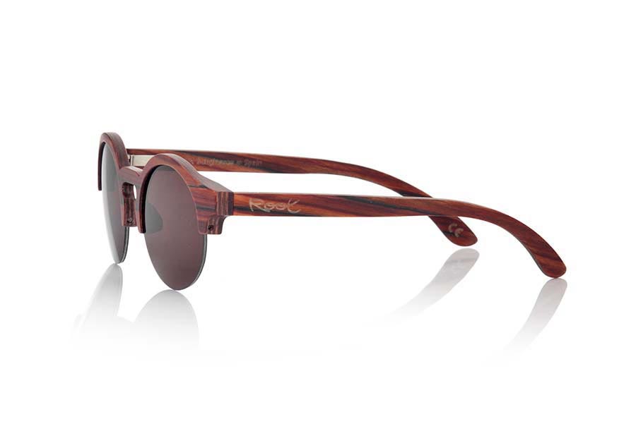 Wood eyewear of Rosewood QINN. Sunglasses QUINN are made of laminated Sandal wood, it is a semi open subtle lines rounded model where the lens is the protagonist, the bridge is built in wood, you will surprise the beauty of wood and reddish and soft lines: front Measure: 144x51mm for Wholesale & Retail | Root Sunglasses® 