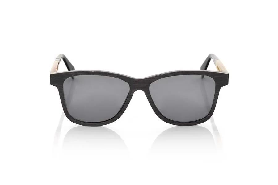 Wood eyewear of Ebony UTAH. UTAH sunglasses are manufactured in Ebony wood and Asian water buffalo horn. It's a unique model with the front made of ebony feel, and sideburns made with domestic water buffalo horn. Completion of sideburns in his union are finished in acetate and you have internal rod can be adjusted if necessary. Tea will be surprised the beauty of the wood, the unique combination with his pin of an organic and natural material and its design adaptable to all kinds of faces, custom front: 140x45mm for Wholesale & Retail | Root Sunglasses® 