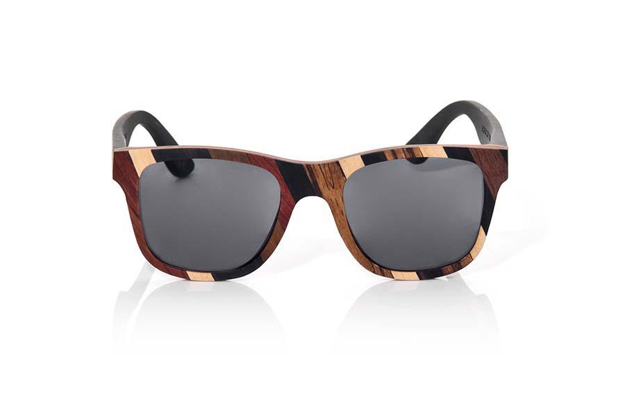 Wood eyewear of Mpingo BORACAI. BORACAI sunglasses are manufactured with a combination of 3 Woods, Mpingo (African black wood) walnut and Zebrano wood. The front of this glass of classical forms suitable for all kinds of people of both sexes displayed a combination of these three Woods in a diagonal design. Sideburns made entirely of Mpingo wood. You will love this sunglasses again design with a touch of color natural and its PIN of this wood natural almost black with a veined subtle and elegant. Front size: 143x51mm for Wholesale & Retail | Root Sunglasses® 