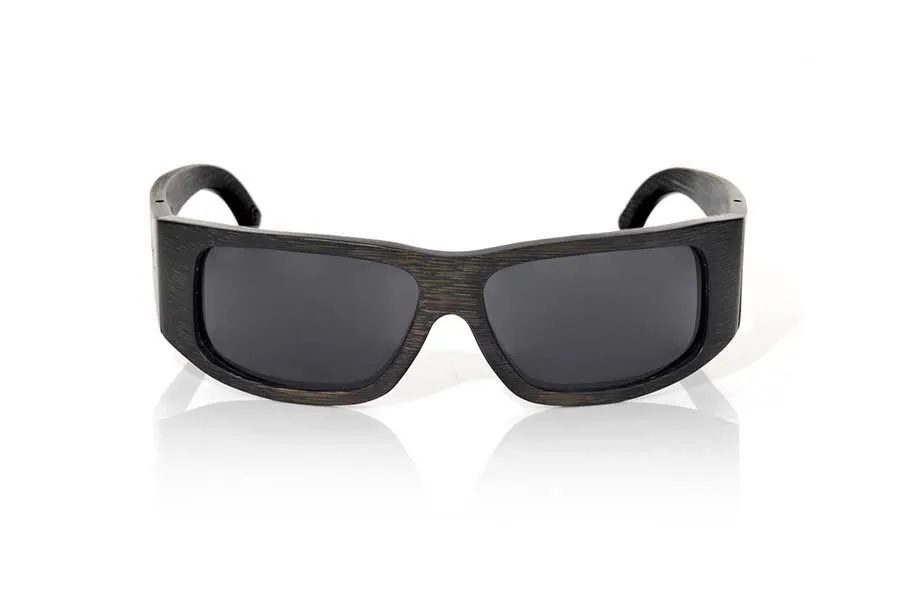 Wood eyewear of Bamboo FUNK. FUNK sunglasses are made of bamboo wood stained in dark brown tones. The front of this glass is curved in such a way that it covers the entire face is defortivo design and is suitable for all kinds of people of both sexes.  The pins are very wide so that they cover most of the face are made of solid bmbu dyed in shades of dark brown wood. The lightness of this glass, their resistance and the combination of lenses will surprise you. Front size: 150x47mm for Wholesale & Retail | Root Sunglasses® 