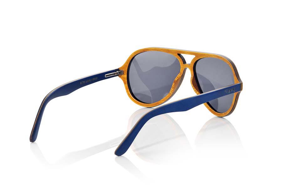 Wood eyewear of Skateboard FLYER. TheFLYER sunglasses are manufactured in wood laminated of Maple skateboard each an of the different sheets that make up its structure have been stained in different colors. The front of this glass is presented in shades of blue navy and interior in a yellow egg, rounded tone reminiscent of the famous Aviator, design model defortivo and elegant, is suitable for all kinds of people of both sexes.  Sideburns are very thin and are presented in shades of navy both inside and on the outside by inserting a blade in shades of yellow egg in the intermediate zone. You will like the lightness of this glass, shape, resistance and the combination of colors. Front size: 145x52mm for Wholesale & Retail | Root Sunglasses® 