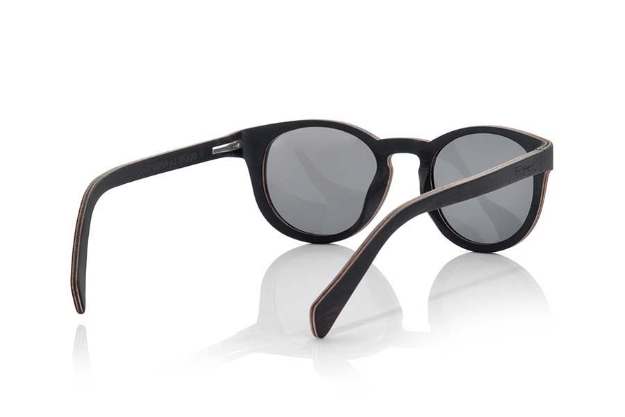 Wood eyewear of Mpingo PANAY. PANAY sunglasses are made of Mpingo and maple wood, it is a rounded model of classic lines where the hinge pins arises in advance in the same and blades of wood at a 90 ° angle will surprise you the combination of Woods its careful completion, their form and the range of available lenses. Front size: 143x48mm for Wholesale & Retail | Root Sunglasses® 