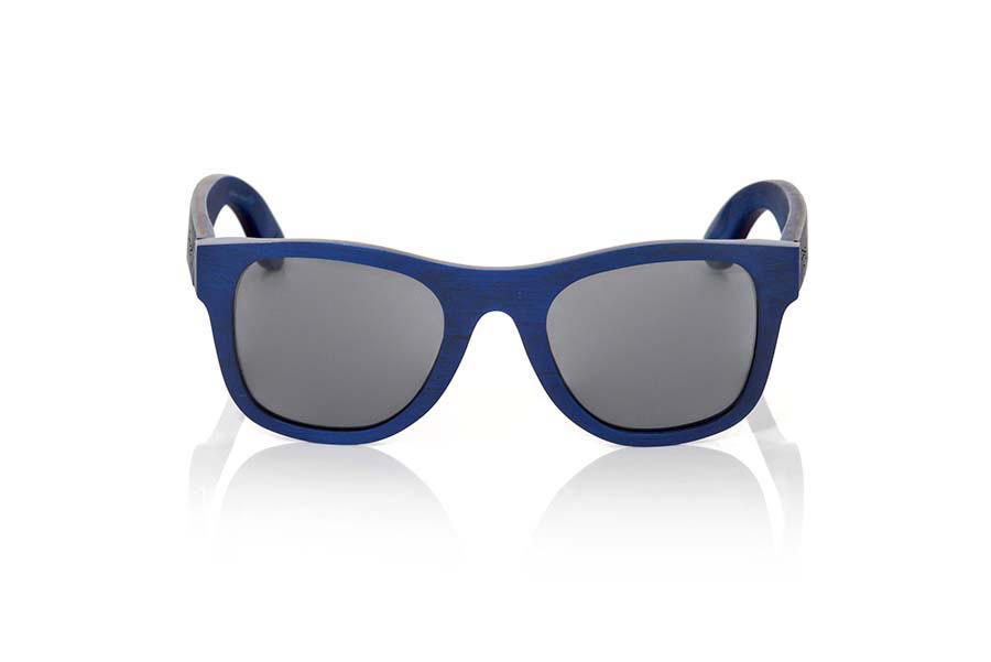 Wood eyewear of Skateboard MARAJO. The MARAJÓ sunglasses are manufactured in wood laminated of Maple skateboard each an of the different sheets that make up its structure have been stained. The front of this glass comes in dark blue tones tato in the interiorcomo in the area outside central structure has sandwiched a dark yellow color, of classical forms plate is suitable for all kinds of people of both sexes.  Sideburns in dark blue tones like the front interspersed with a blade in the dark yellow tones in the intermediate zone. You will like the lightness of this glass, its shape and the combination of colors. Front size: 138x49mm for Wholesale & Retail | Root Sunglasses® 