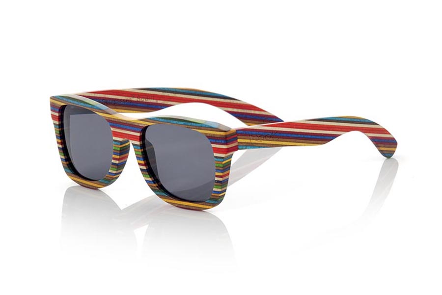 Wood eyewear of Skateboard modelo SANOOK. The sunglasses SANOOK are made of laminated 9-ply wood with a pattern of nine pastel colors, the saddle is somewhat smaller than other similar models, are really good to almost everyone, the SANOOK are a very special model with which You will ignite your own and strangers. Available in different lens combinations. Frontal Measurement: 144x48mm | Root Sunglasses® 