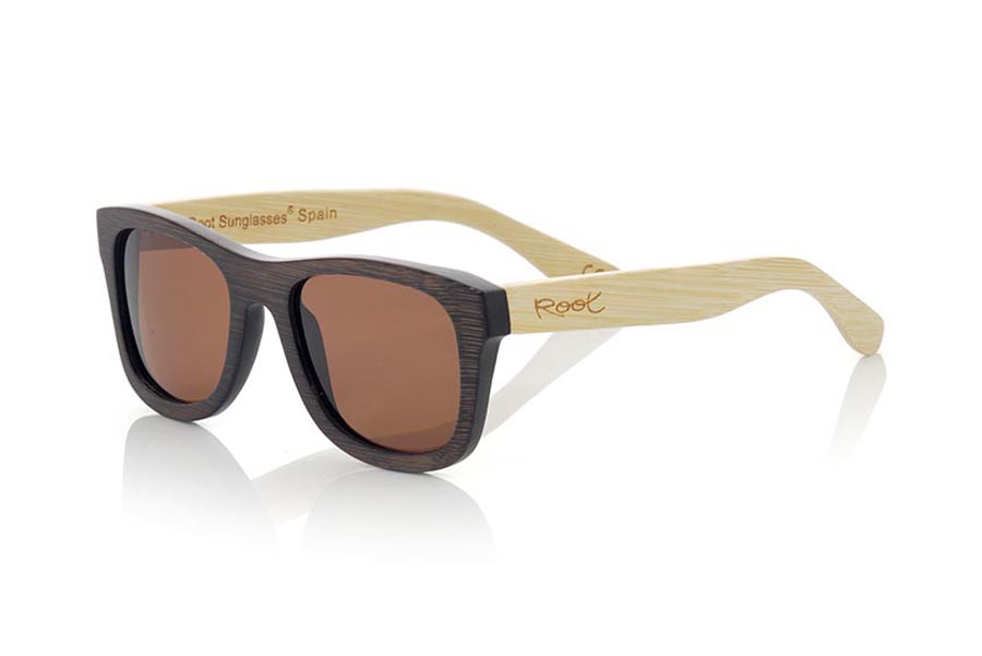 Wood eyewear of Bamboo WOODHEART. The Woodheart sunglasses  are made of bamboo wood, with the front dyed  in brown tones and sideburns in natural bamboo color  where the wood grain is always present it is a classical frame standard size that feels good to both boys and girls.  Front measssure 147x50mm for Wholesale & Retail | Root Sunglasses® 