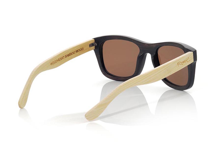 Wood eyewear of Bamboo WOODHEART. The Woodheart sunglasses  are made of bamboo wood, with the front dyed  in brown tones and sideburns in natural bamboo color  where the wood grain is always present it is a classical frame standard size that feels good to both boys and girls.  Front measssure 147x50mm for Wholesale & Retail | Root Sunglasses® 