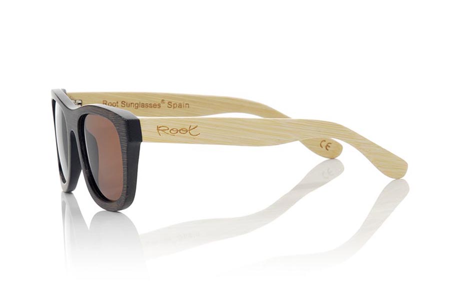 Wood eyewear of Bamboo WOODHEART. The Woodheart sunglasses  are made of bamboo wood, with the front dyed  in brown tones and sideburns in natural bamboo color  where the wood grain is always present it is a classical frame standard size that feels good to both boys and girls.  Front measssure 147x50mm for Wholesale & Retail | Root Sunglasses® 