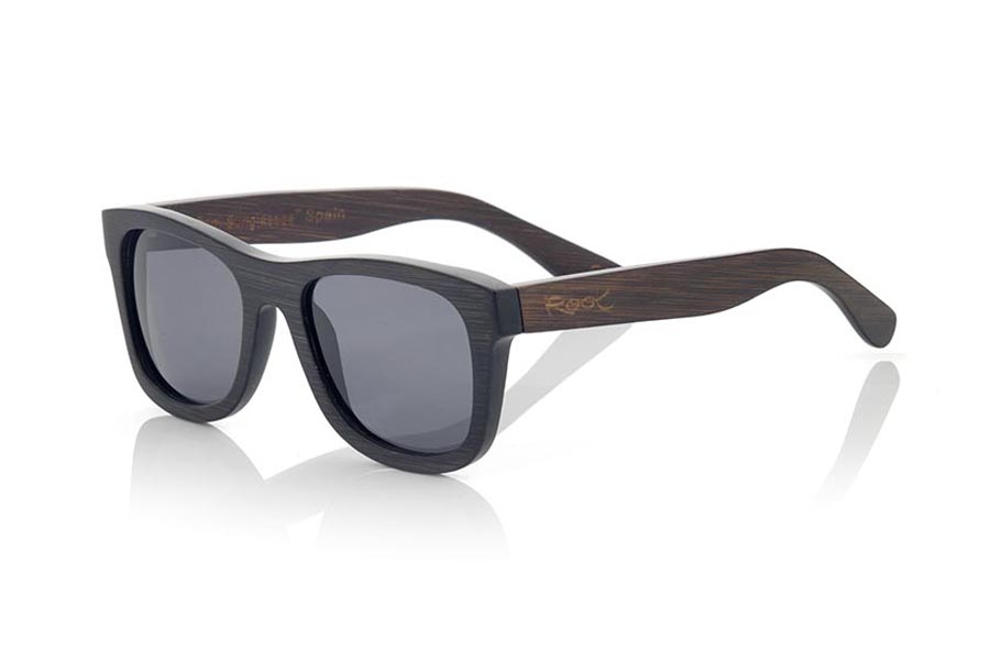 Wood eyewear of Bamboo GENESIS S. Genesis Wood Sunglasses are made in two-tone tinted bamboo with black front and dark brown sideburns.  is a classic frame with a small size for people who feel better glasses  Small, they are elegant and discreet, however they will not be able to stop looking at you. frontal measurement:  136x44mm for Wholesale & Retail | Root Sunglasses® 